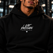 I EAT PRESSURE chest graphic and diamond on a black microterry pullover hoodie